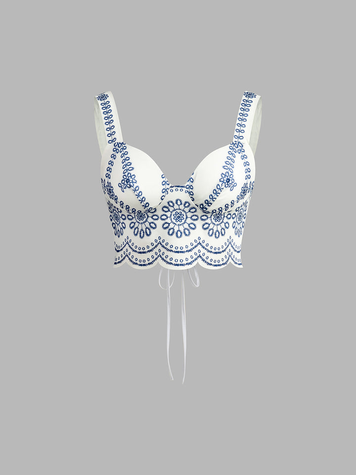 Stylish women's printed two-piece skirt set with a sleeveless top, ideal for a chic summer casual outfit.