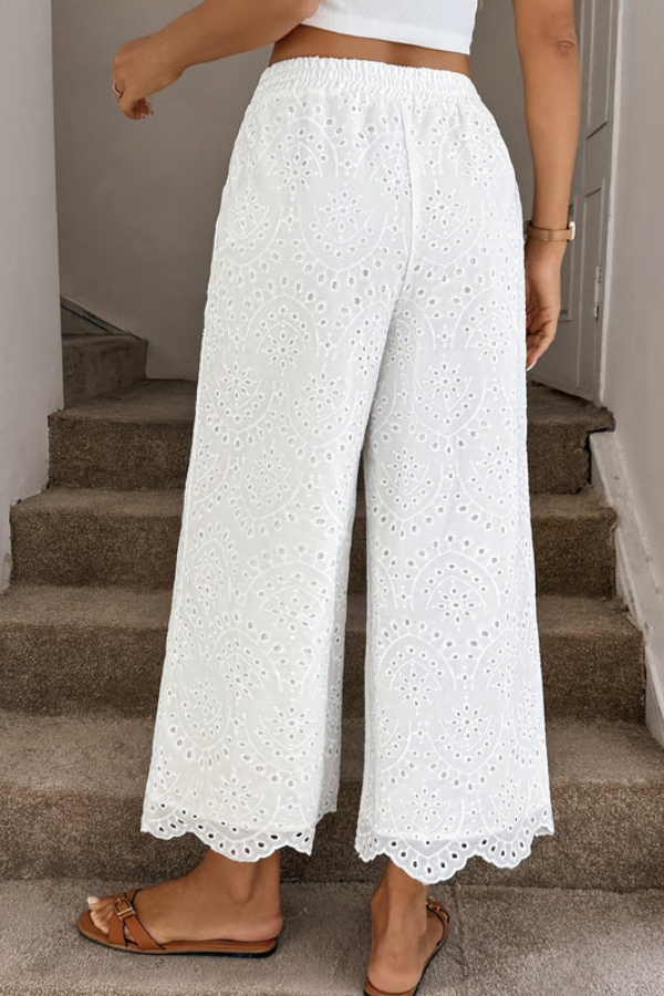 Boho women's cropped capri pants with eyelet, relaxed fit, essential for summer vacation & travel.