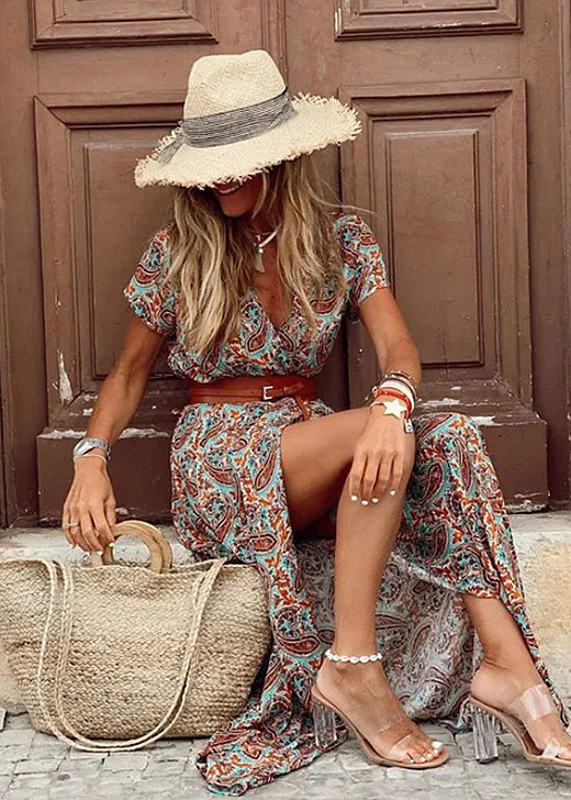 Stylish women's floral boho maxi dress with side slit, offering a flowy & elegant look for summer days.