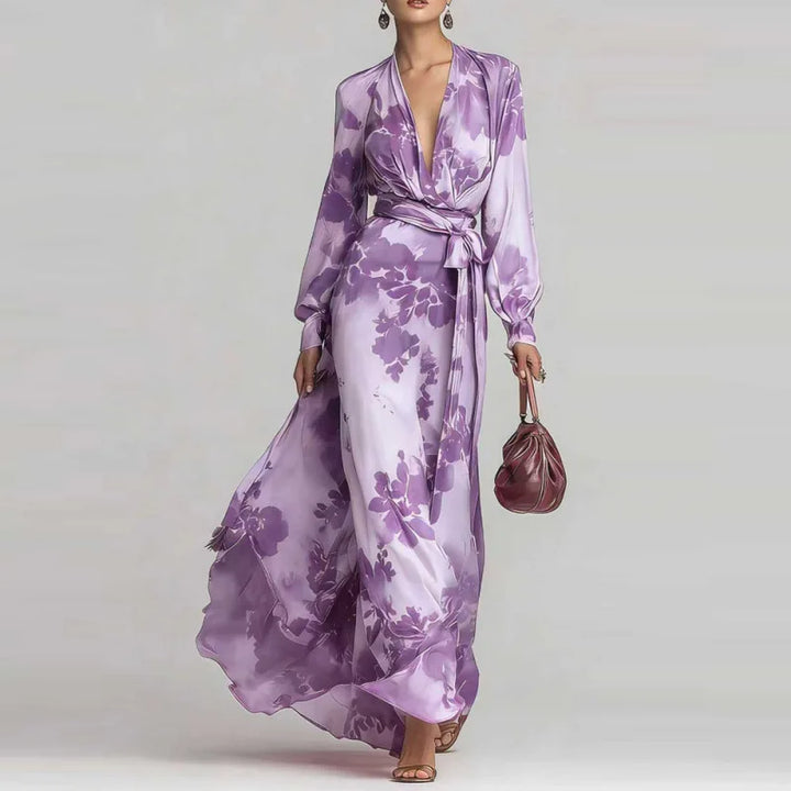 Stylish women's bohemian summer maxi dress, V-neck, long lantern sleeves, and a cinched waist belt for elegance.