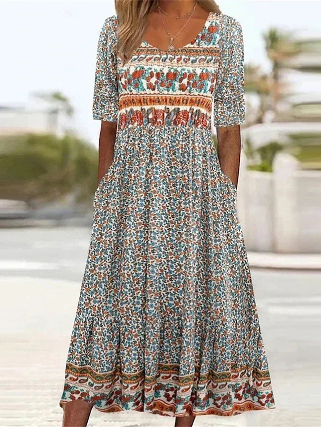 Women's Bohemian Midi Dress with Pockets. Relaxed fit, short sleeve, perfect for summer casual wear.