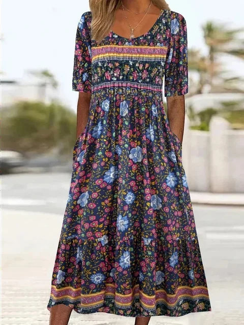 Stylish women's bohemian midi dress, short sleeve with pockets. A chic printed boho dress for summer & vacation fashion.