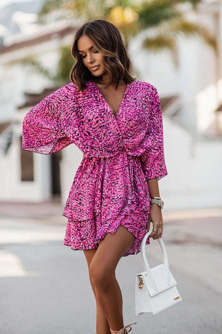 Comfortable flowy off-shoulder mini dress for women, offering a relaxed bohemian style for warm weather.