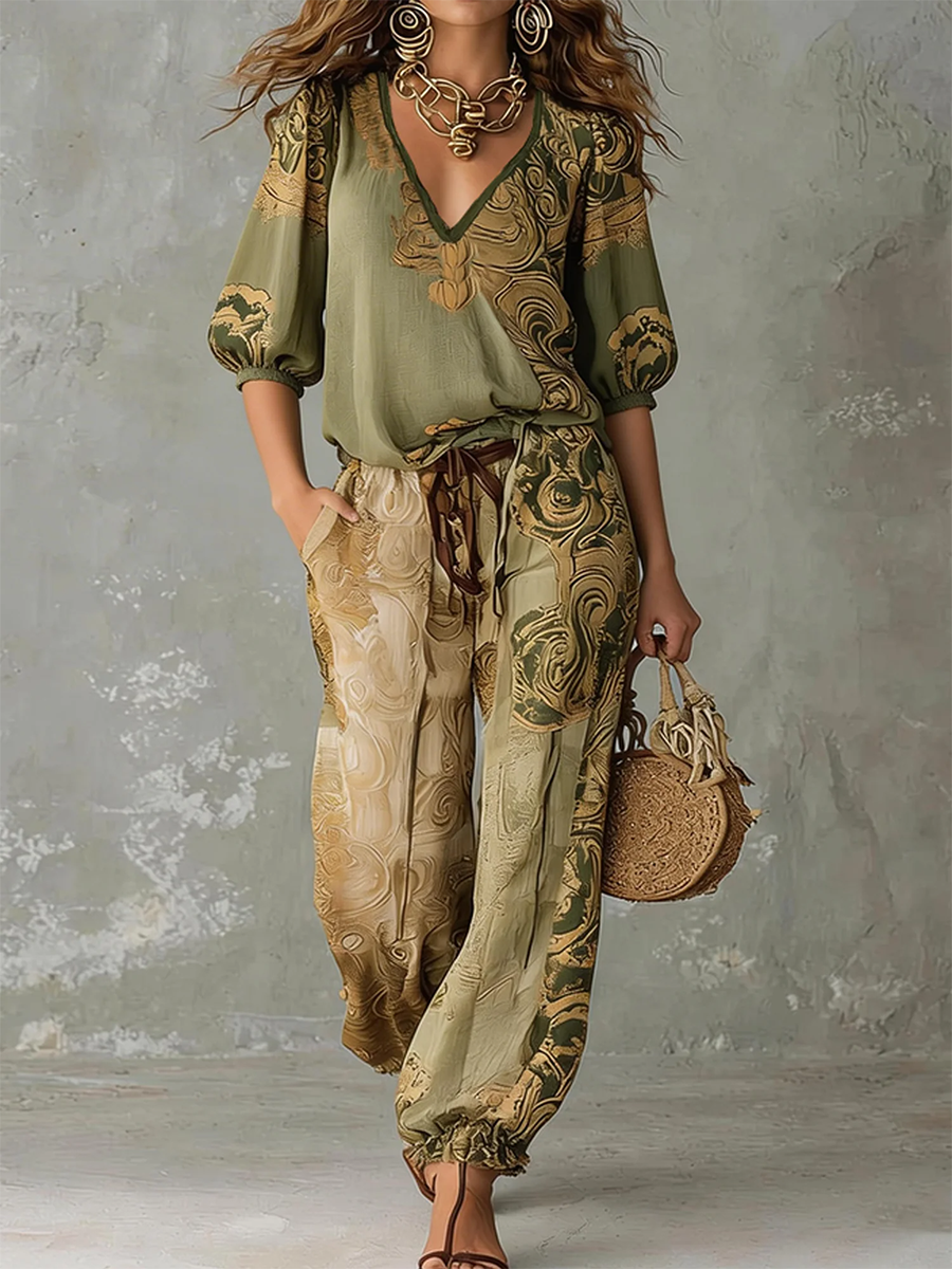 Effortless bohemian print co-ord set with a v-neck half-sleeve top and wide-leg pants for women's casual wear.