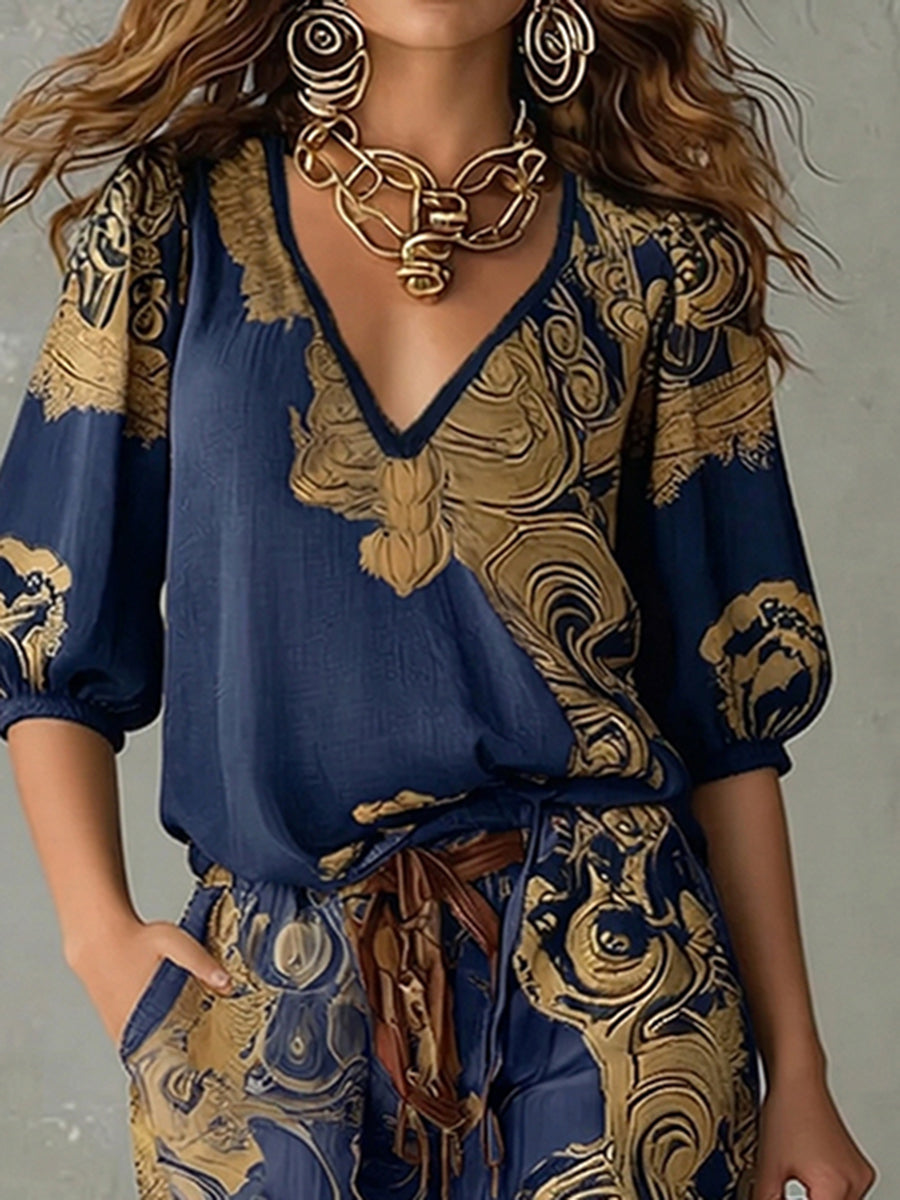 Women's vibrant bohemian print v-neck top with half sleeves, part of a stylish two-piece casual summer set.
