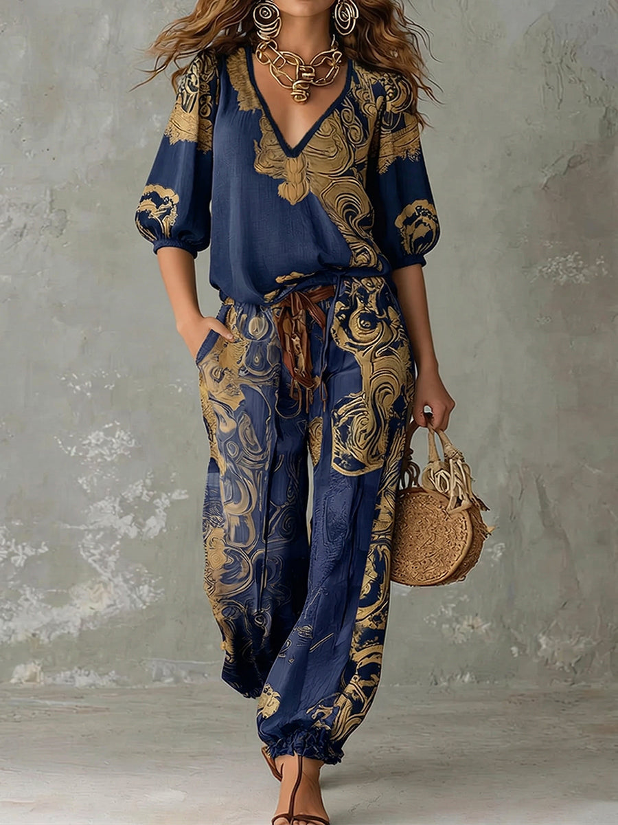 Relaxed fit women's bohemian print pants, matching a v-neck top in a comfortable two-piece summer co-ord set.