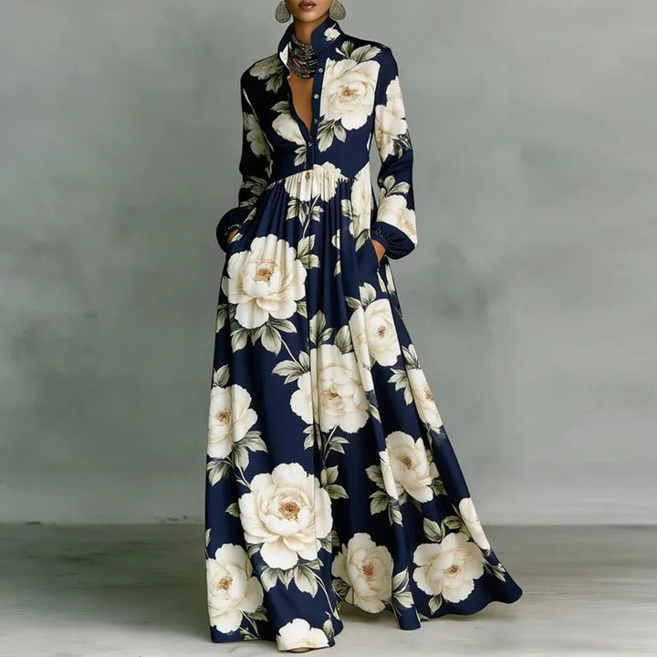 Printed bohemian maxi dress for women featuring a stylish stand collar, long sleeves & elegant flow.