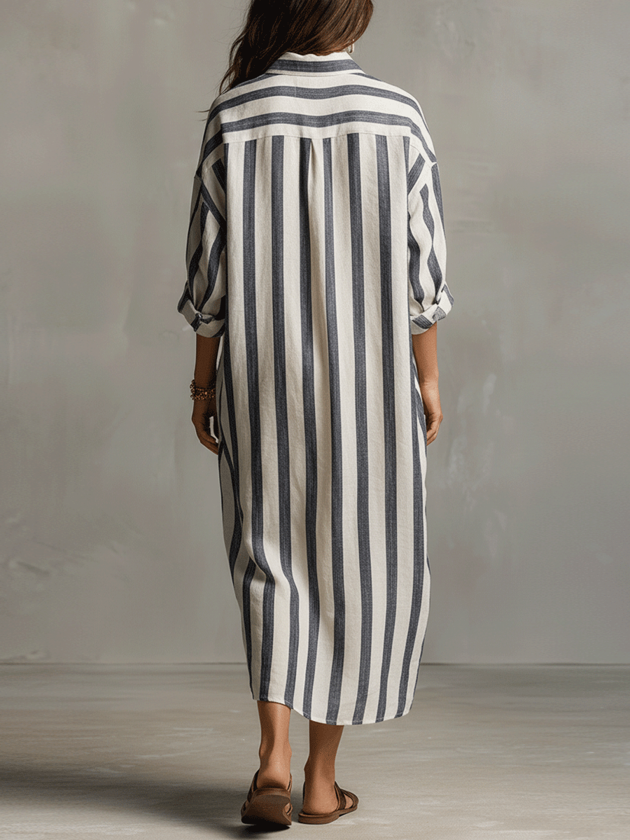 Flowy women's maxi dress with bohemian stripes, perfect for casual summer days & beachwear.