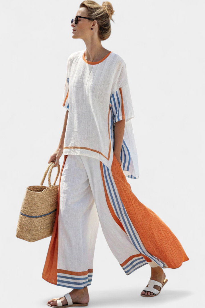Women's bohemian striped two-piece lounge set. Relaxed tunic and wide leg pants, perfect for resort wear.
