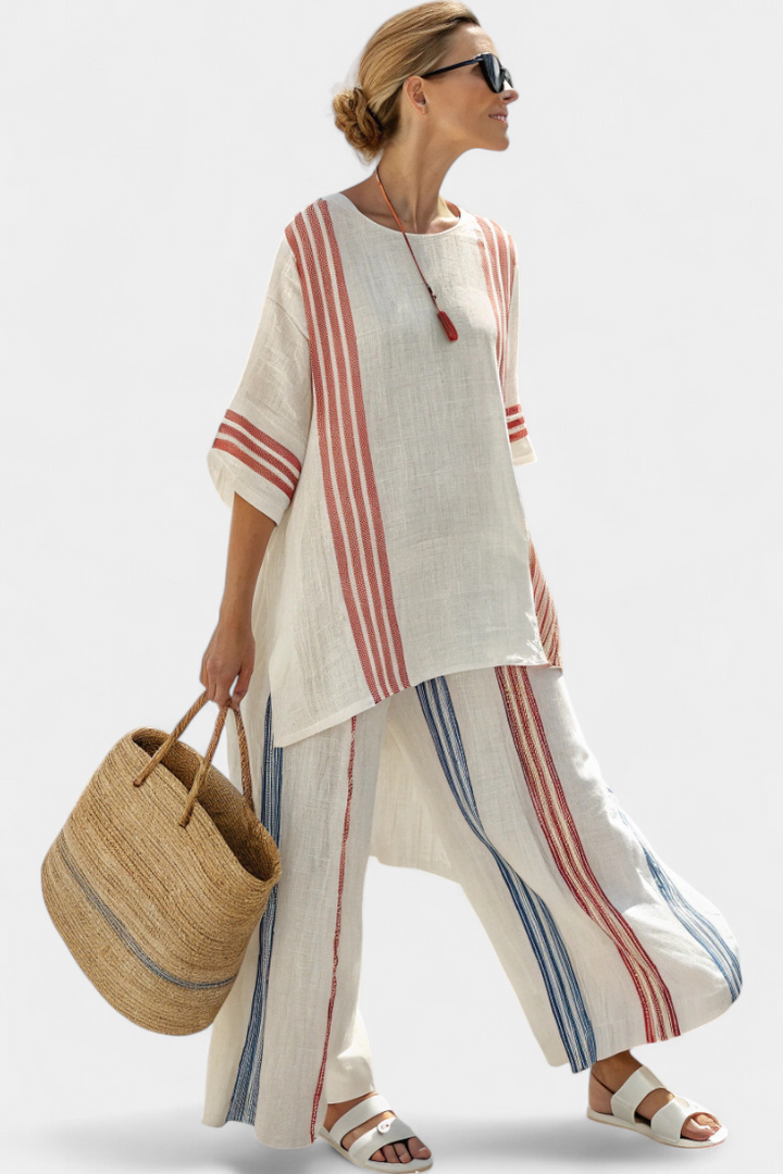 Bohemian women's striped lounge set featuring a tunic top and comfortable wide-leg pants. Ideal casual outfit.
