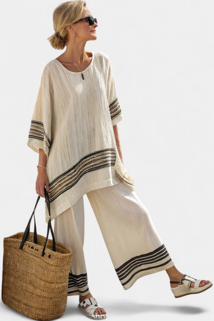 Chic women's bohemian striped two-piece matching set, great for lounge, resort wear, or a stylish casual look.