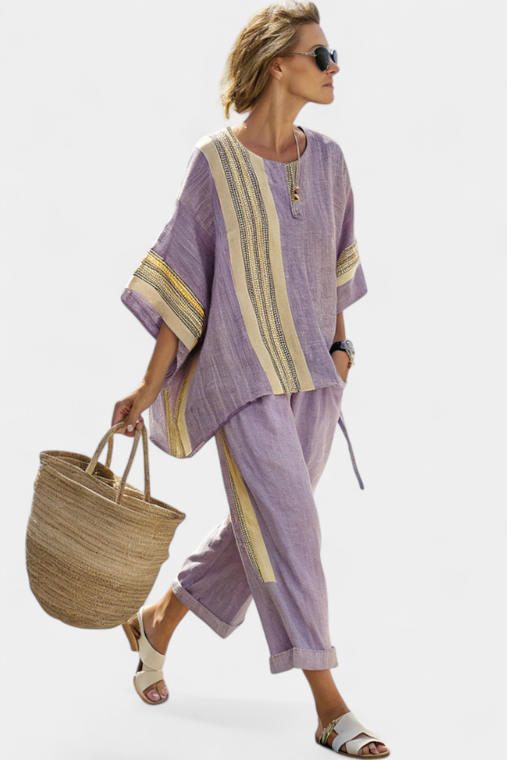 Flowy women's striped two-piece set: a bohemian tunic and wide-leg pants for comfortable everyday or resort wear.