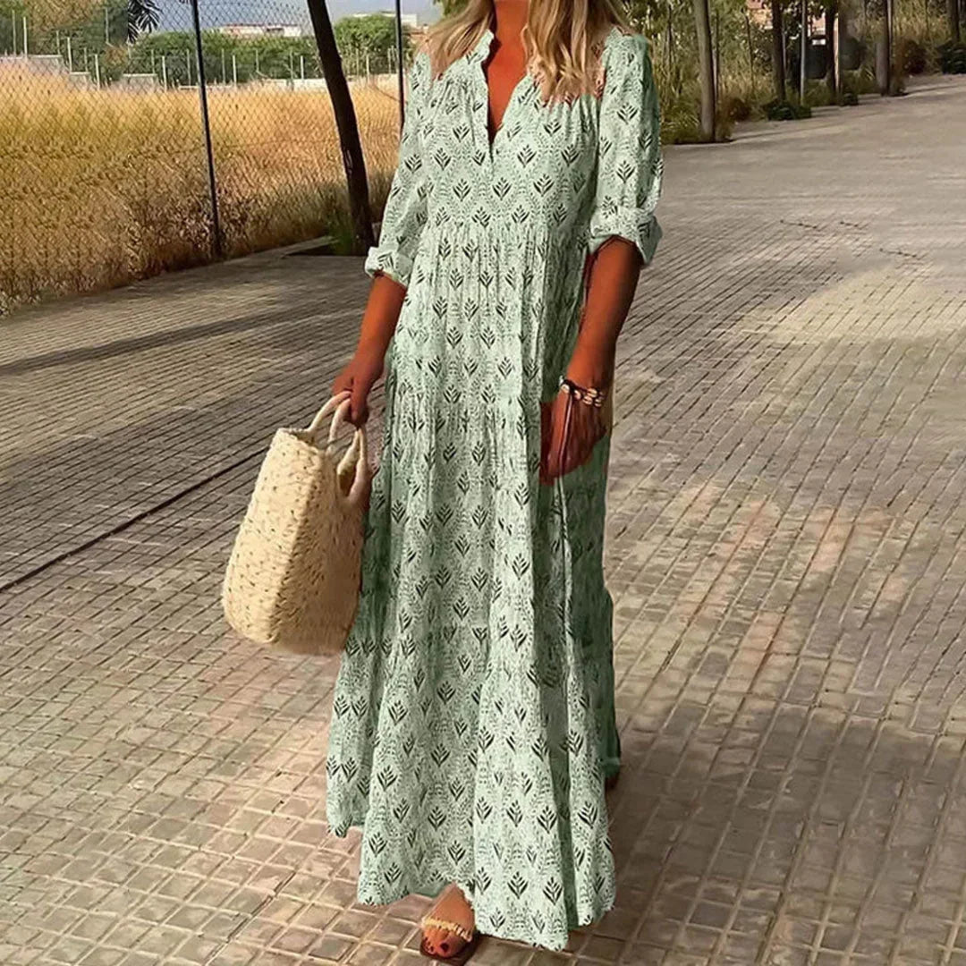Flowing women's bohemian maxi dress, V-neck, long sleeves, comfortable for beach, summer, or casual everyday wear.