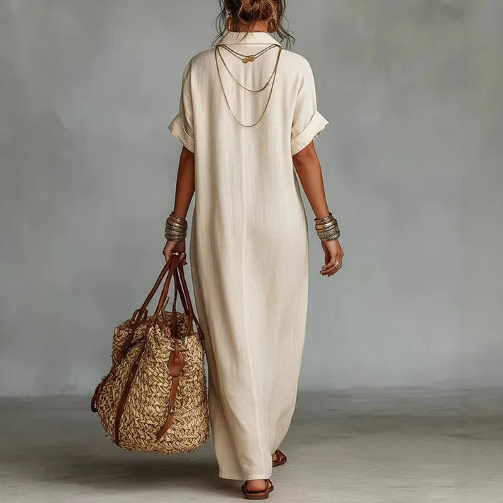 Elegant women's V-neck printed maxi dress, bohemian style, ideal for beach, vacation & casual wear.