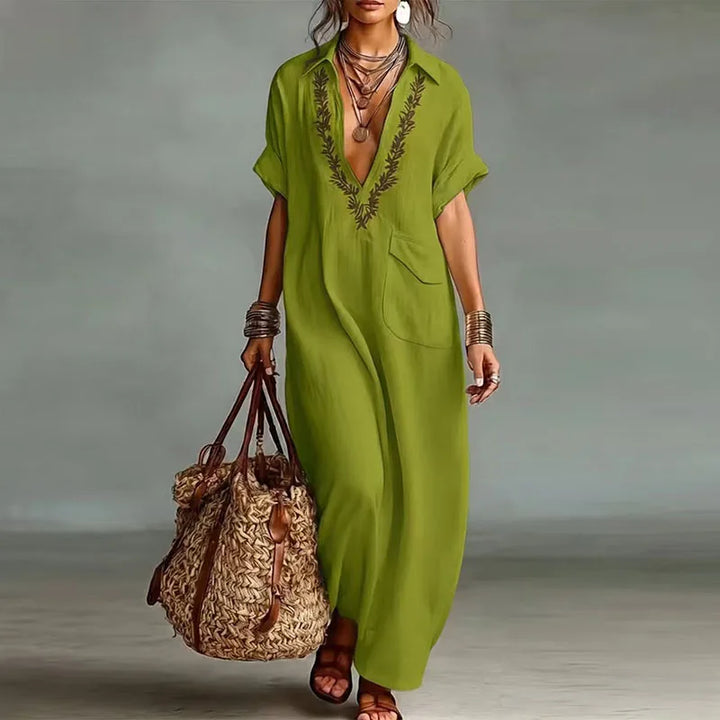 Comfortable women's beach maxi dress, V-neck, colorful bohemian print; great for resort & holidays.