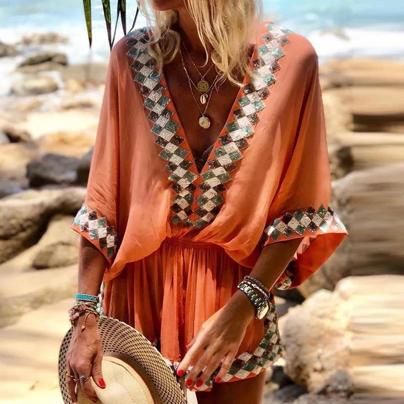 Casual women's short V-neck romper. One-piece bohemian jumpsuit, ideal for summer outfits & relaxed wear.