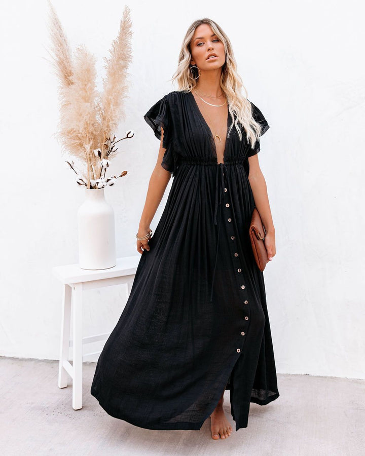 Women's boho beach cover up kimono dress with a v-neck, flowing fabric, perfect for summer resort wear.