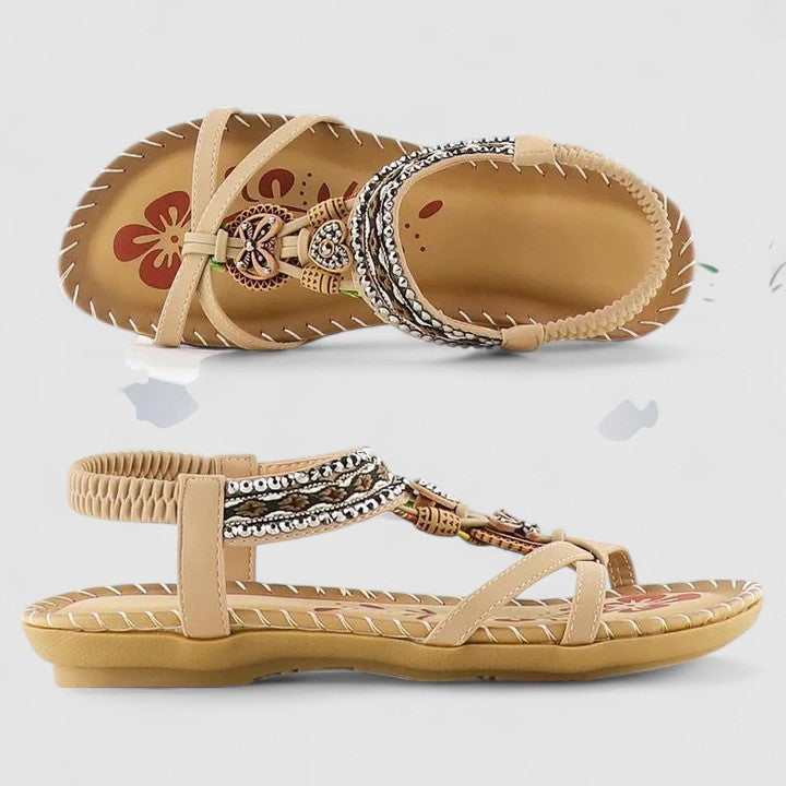 Versatile women's embellished flat sandals with Boho beads, rhinestones, and a toe ring, great for summer adventures.