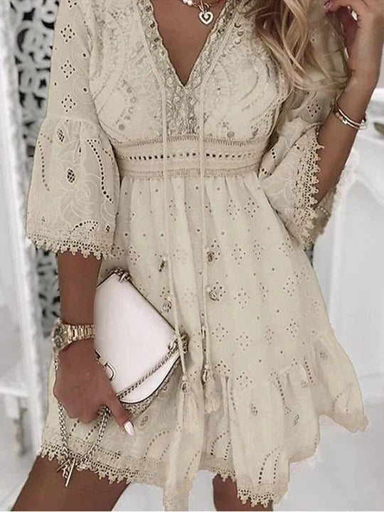 Women's boho chic embroidered mini dress with elegant flare sleeves, perfect for summer beach & vacation.