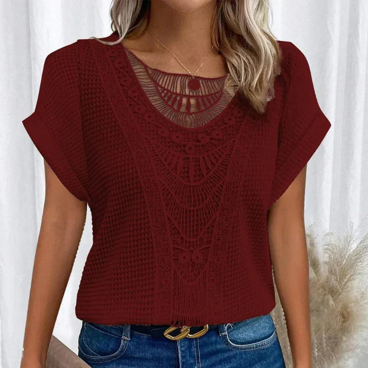 Women's relaxed fit boho crochet short sleeve top. An elegant casual piece for versatile summer fashion.