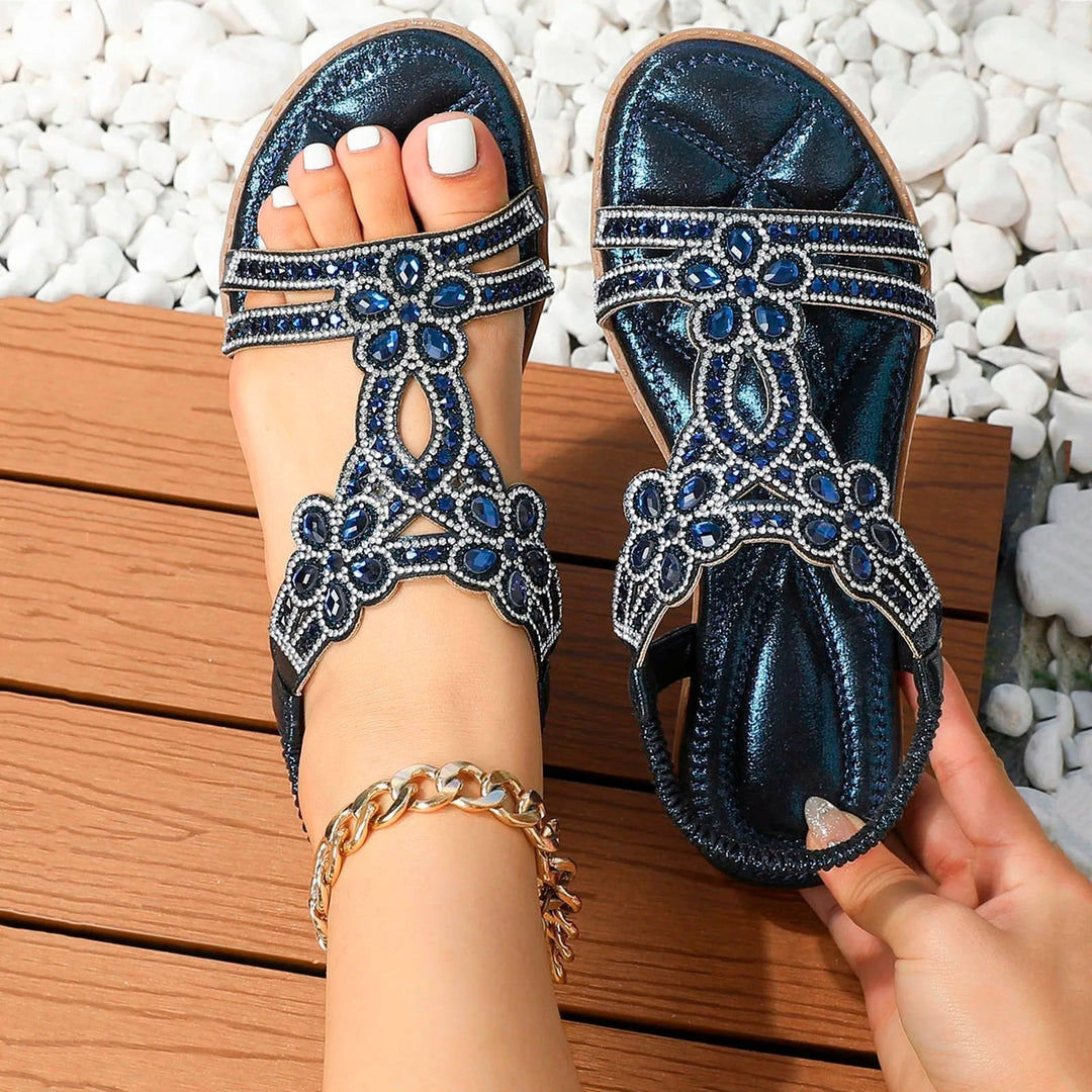 Cushioned women's boho flat sandals, offering ultimate comfort for casual daily and travel adventures.