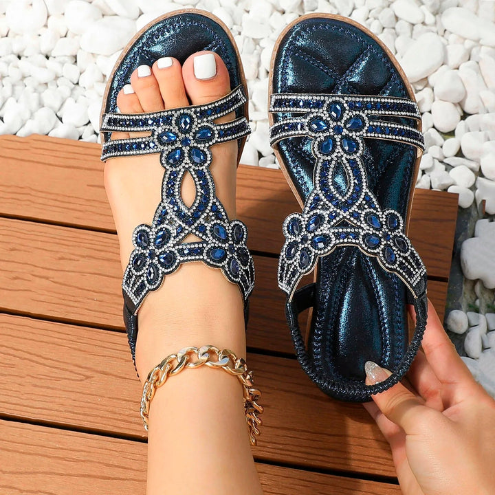 Cushioned women's boho flat sandals, offering ultimate comfort for casual daily and travel adventures.