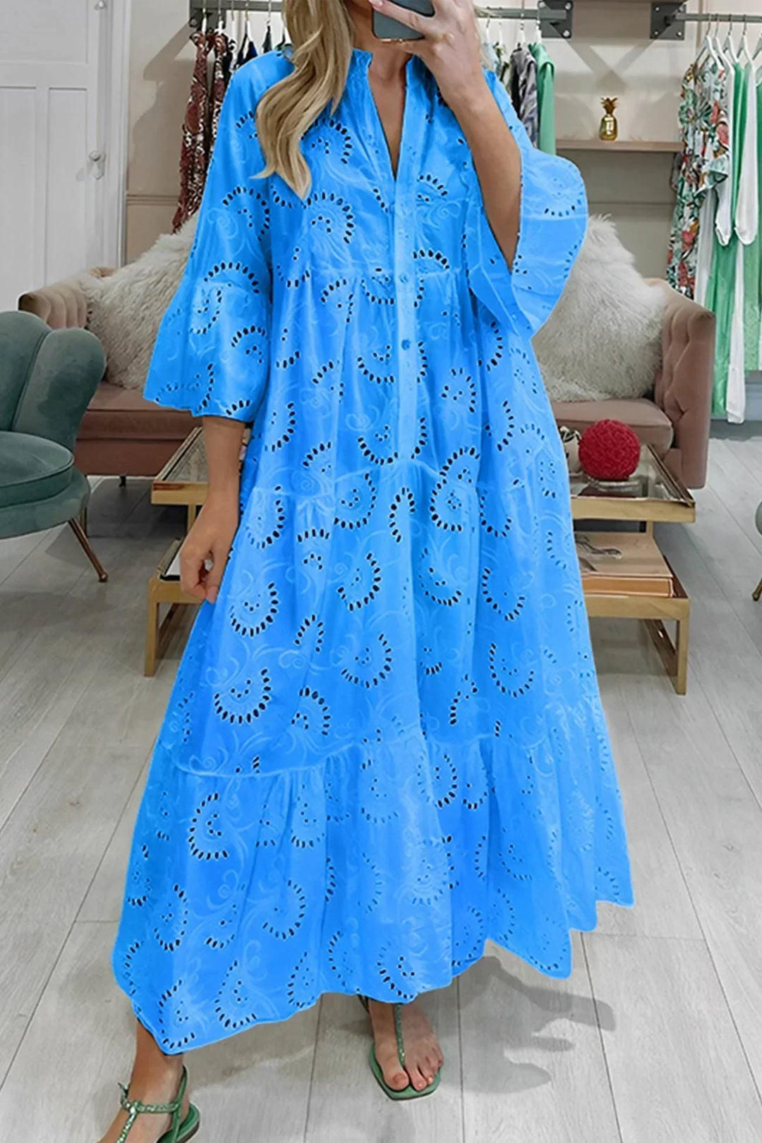 Beautifully embroidered women's boho maxi dress with a flowy design, V-neck, and wide sleeves for summer elegance.