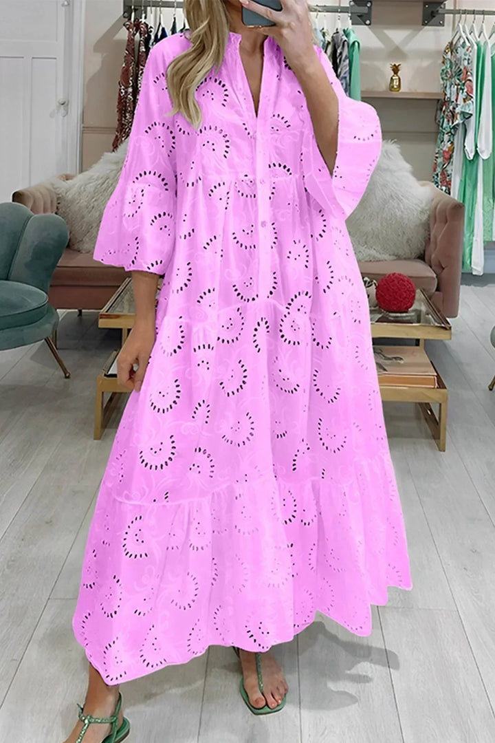 Stunning women's embroidered boho maxi dress, flowy silhouette, V-neck, and wide sleeves for a relaxed summer vibe.