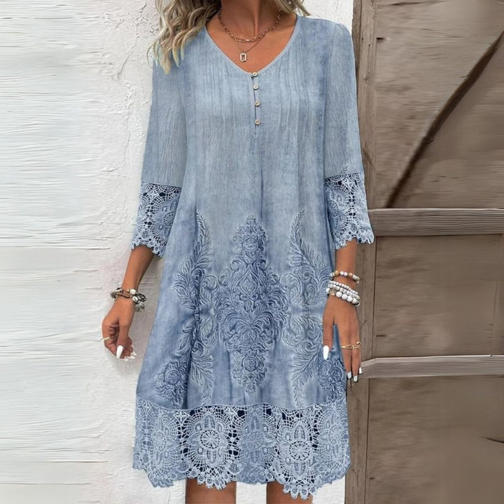Women's Boho Embroidered V-Neck Midi Dress with delicate lace trim, perfect for spring & summer casual wear.