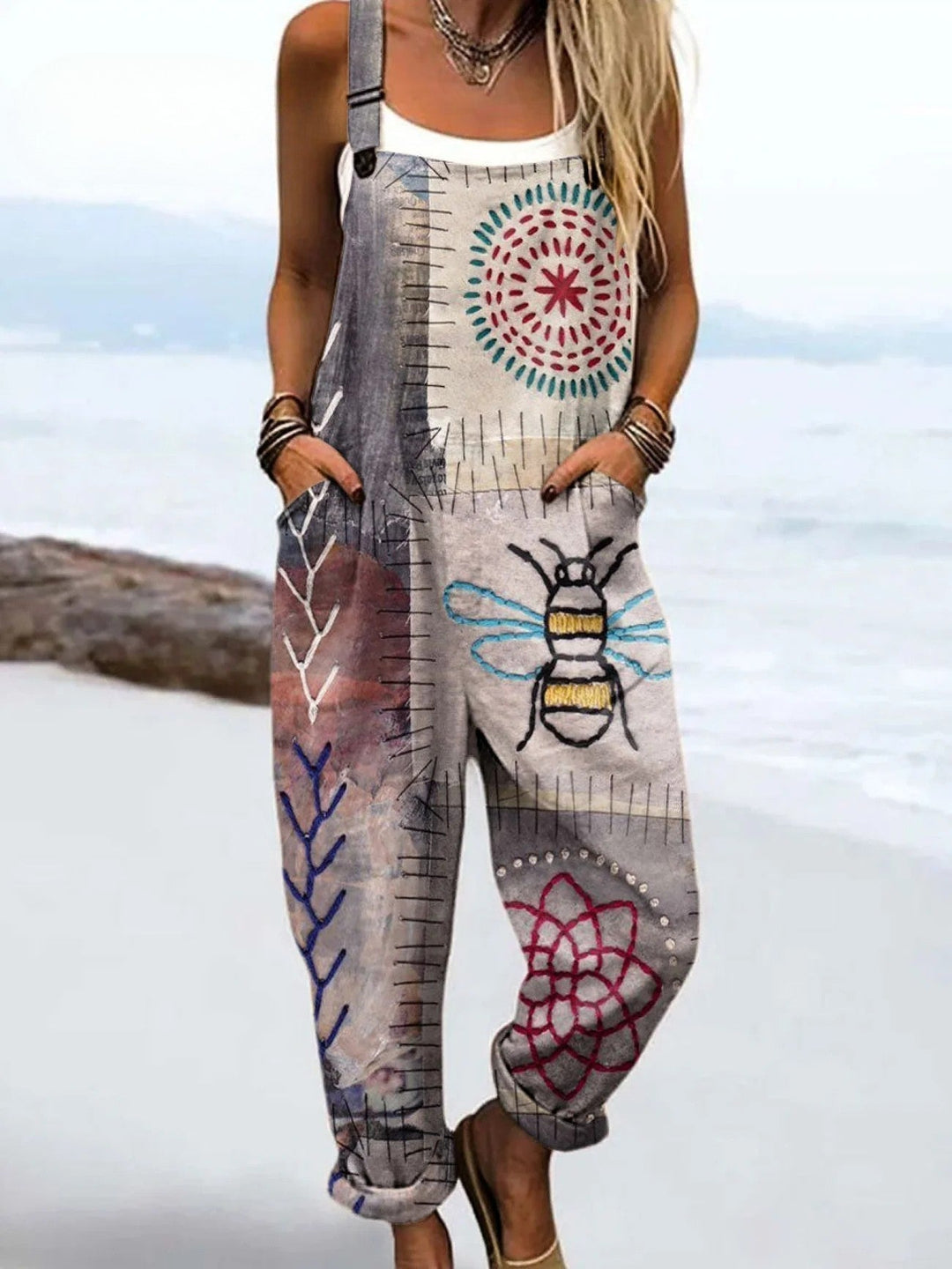 Women's boho embroidery print casual jumpsuit/dungarees with adjustable straps. Relaxed fit for summer festival wear.