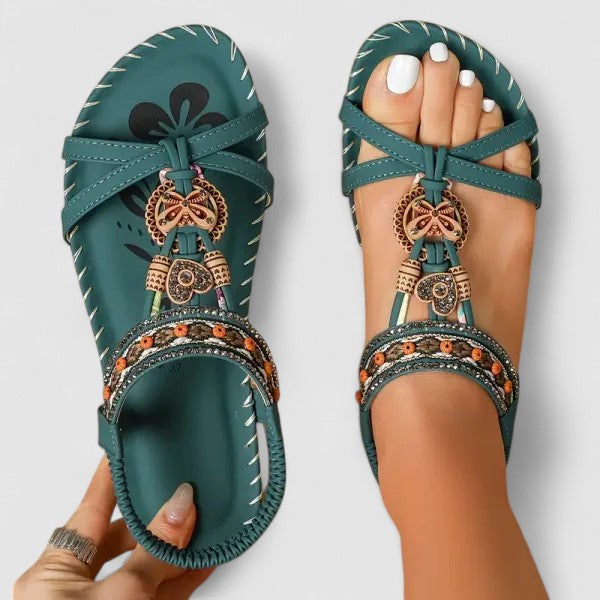 Women's flat ethnic sandals with intricate boho embroidery, comfortable design for travel & summer.