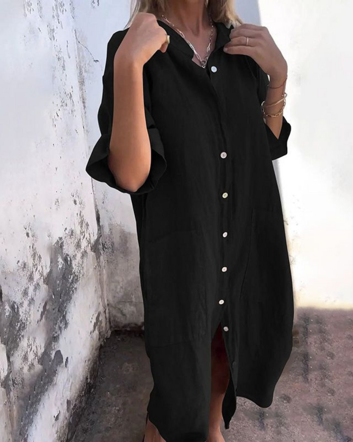 Flowy women's boho maxi dress with vibrant floral print & functional button-down front. Ideal for summer.
