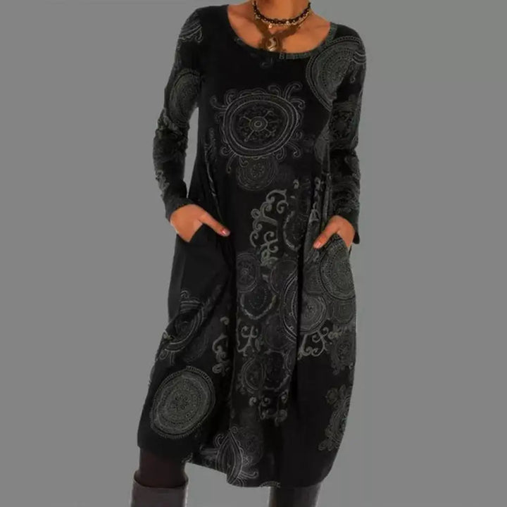 Stylish women's floral boho long sleeve midi dress, offering an elegant yet casual fashion statement.