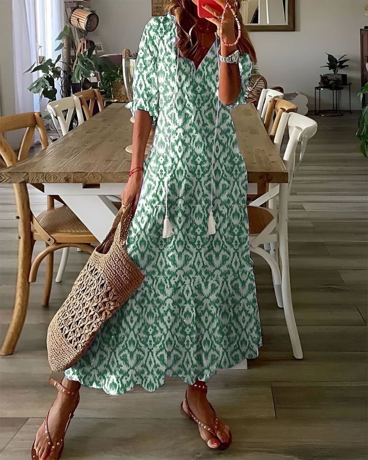Flowy bohemian floral maxi dress for women, comfortable & elegant beach wear.