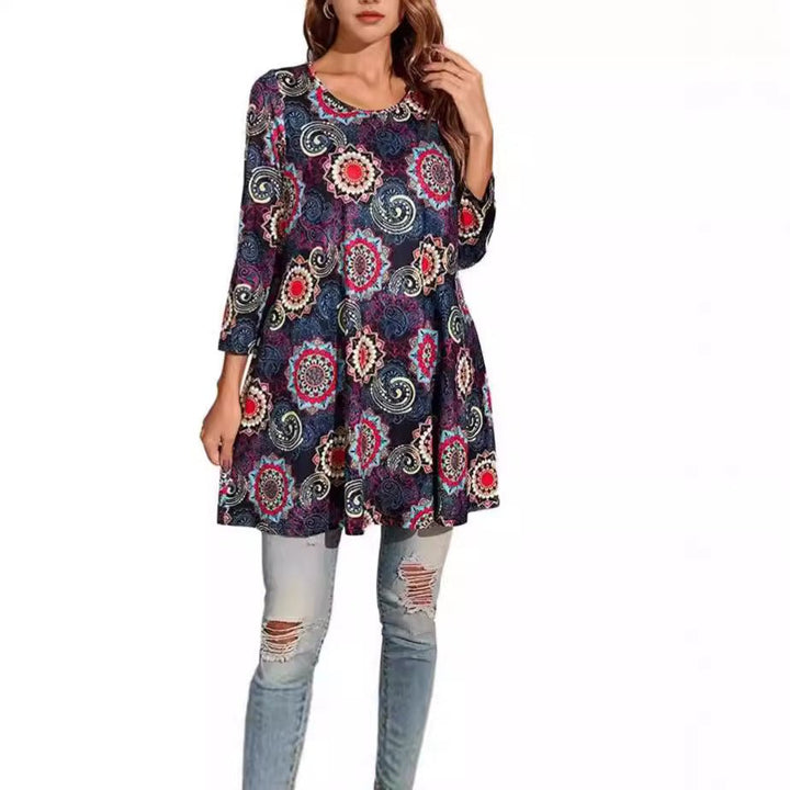 Stylish women's summer top, a bohemian swing tunic with a detailed mandala print and flowy fabric.