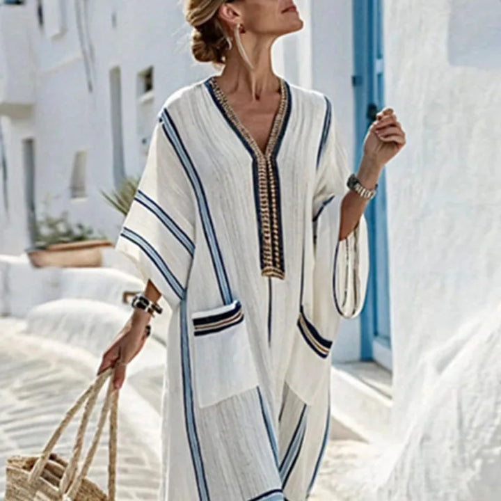 Striped V-neck women's maxi dress, boho style. Perfect flowing long summer dress for casual wear or beach.