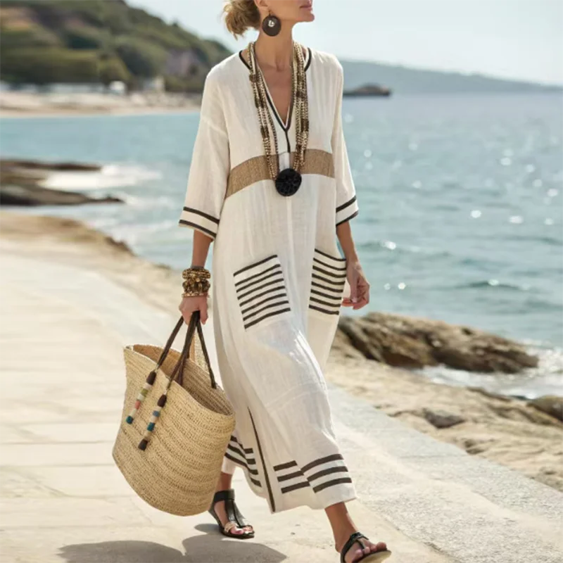 Comfortable V-neck striped boho maxi dress for women. Elegant flowing long dress for summer, beach, or casual.