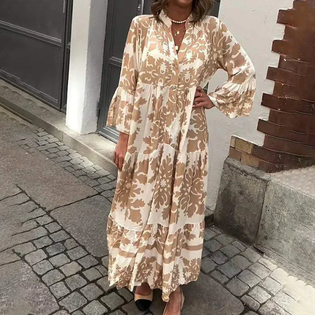 Women's boho maxi dress with baroque print, lantern sleeves, and button-down front. Flowy bohemian style.