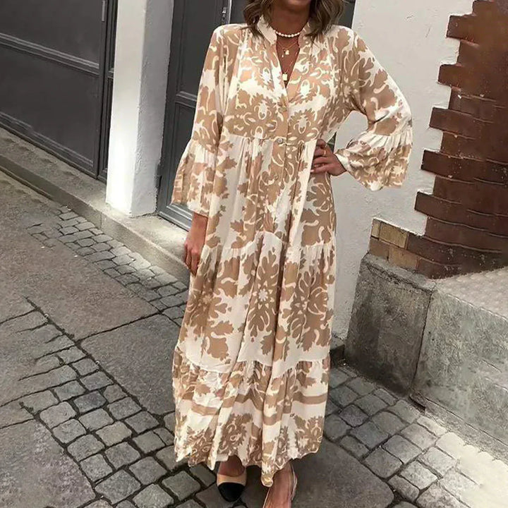 Women's boho maxi dress with baroque print, lantern sleeves, and button-down front. Flowy bohemian style.
