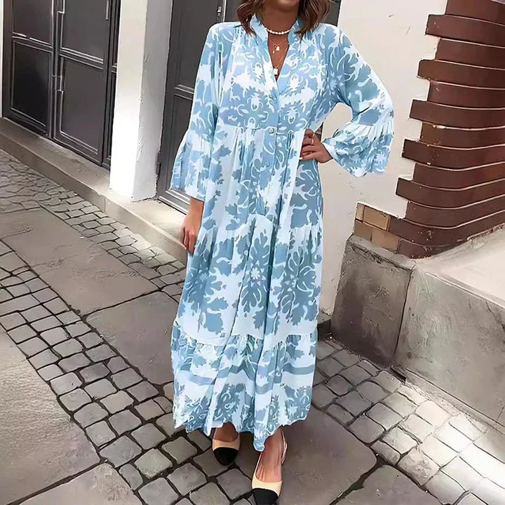 Elegant baroque print maxi dress for women, featuring lantern sleeves, V-neck, and smocked waist detail.
