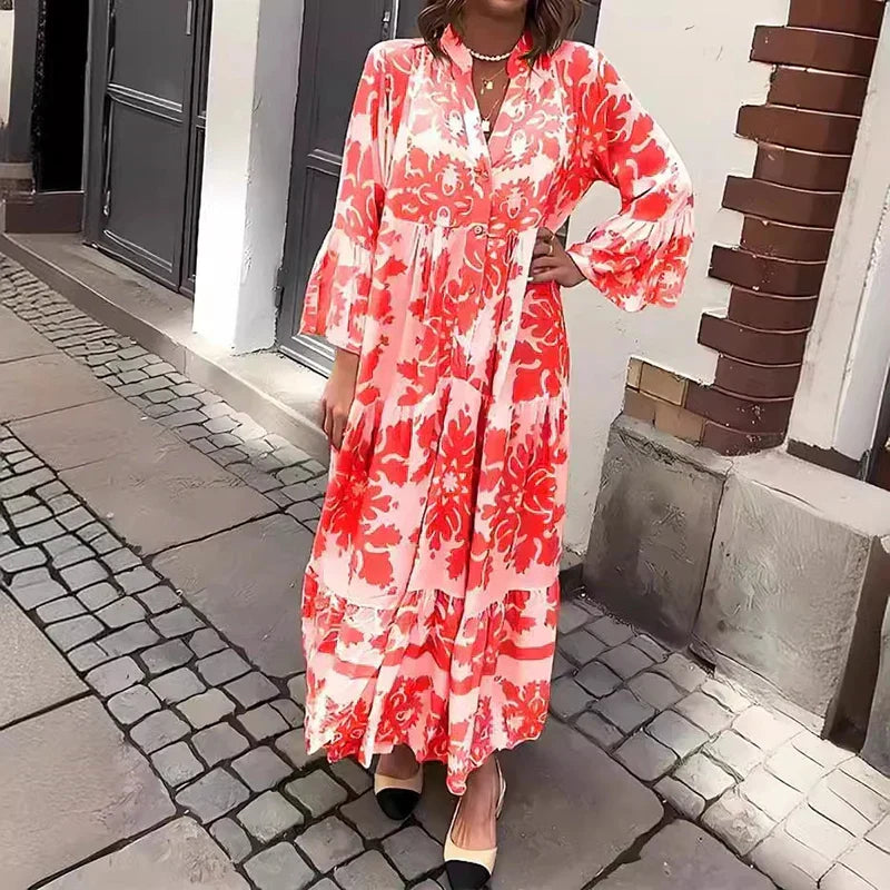 Flowy women's long boho dress with rich baroque print, tiered skirt, and chic lantern sleeves design.