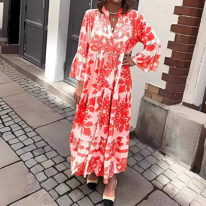 Flowy women's long boho dress with rich baroque print, tiered skirt, and chic lantern sleeves design.