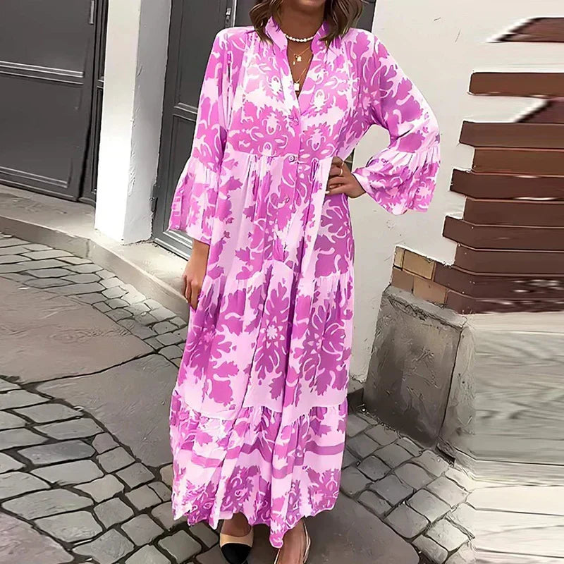 Versatile women's bohemian maxi dress, button-down, with eye-catching baroque print and lantern sleeves.