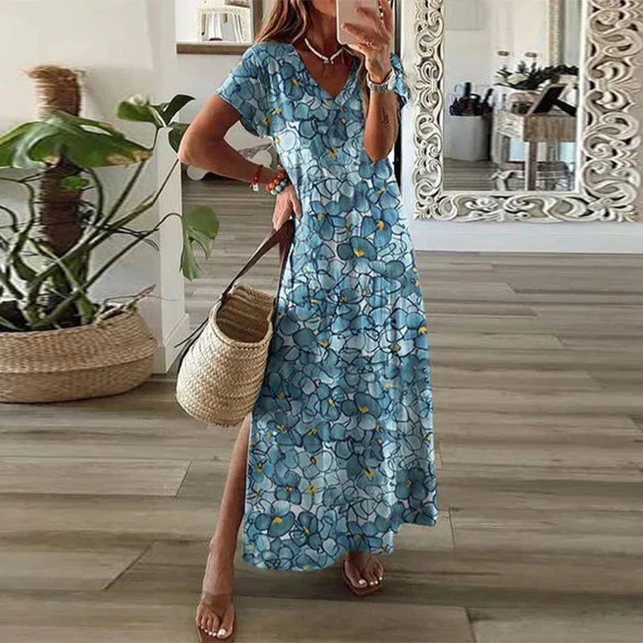 Flowy women's bohemian maxi dress with short sleeves, ideal for comfortable spring and summer casual outfits.