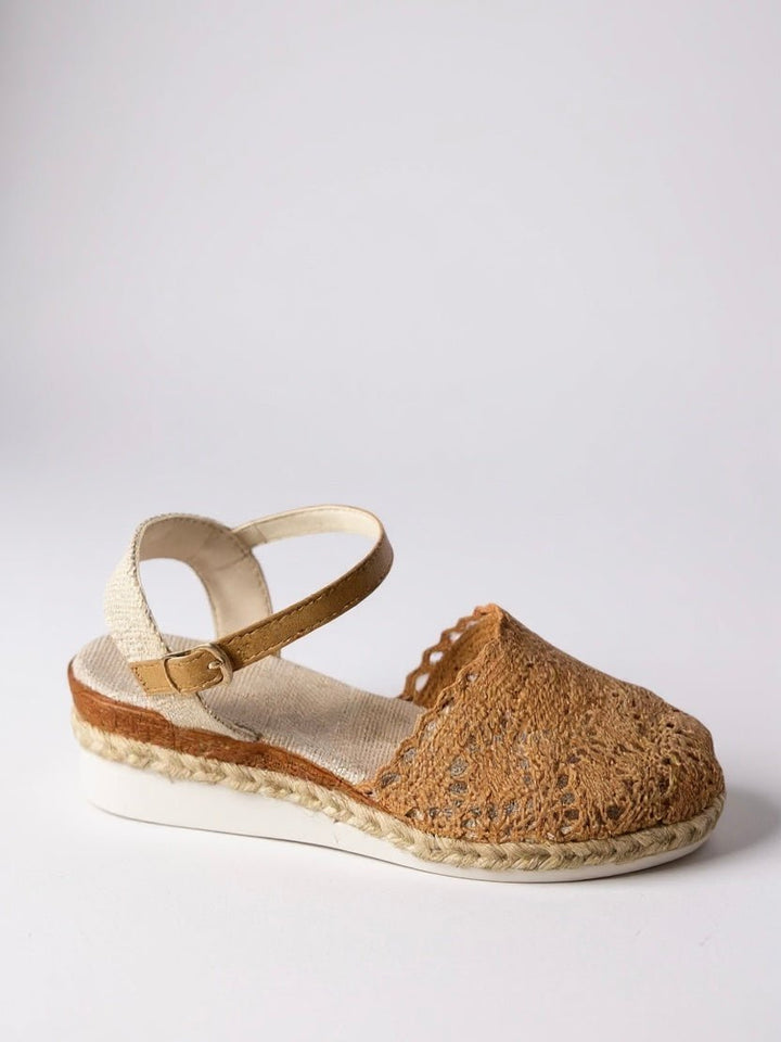 Bohemian platform sandals for women, featuring a stylish textured ankle strap and espadrille sole.