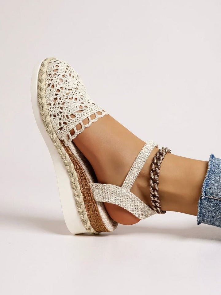 Stylish women's platform sandals, bohemian design with a textured ankle strap for summer.