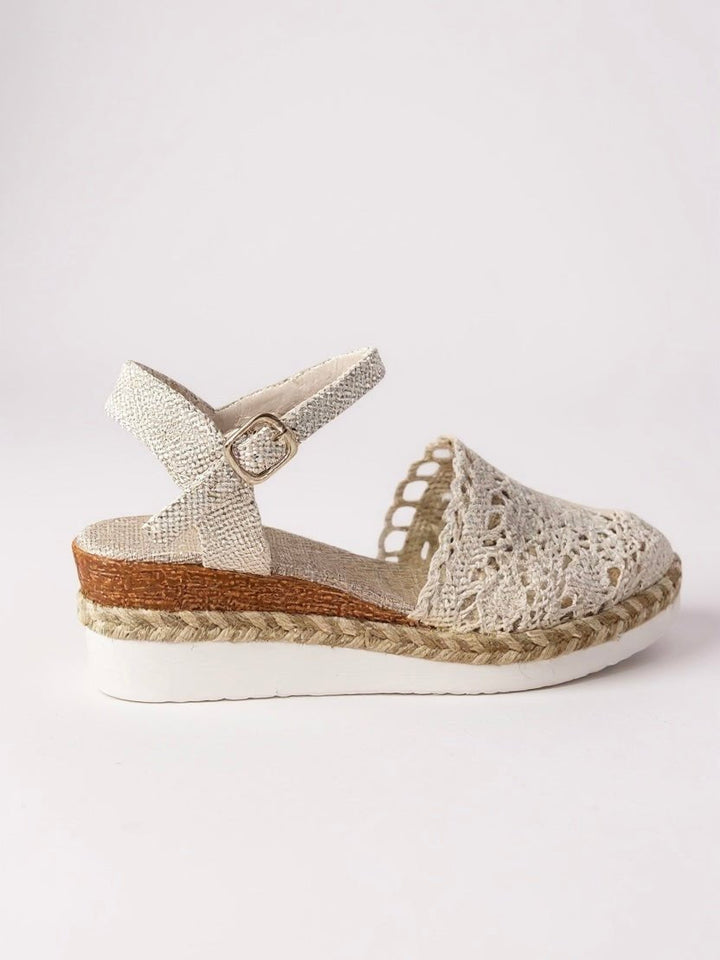 Boho platform sandals for women, casual summer shoes with a distinctive textured ankle strap.