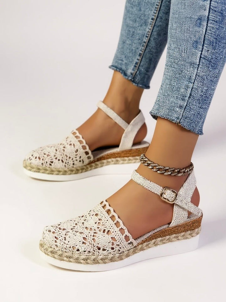 Women's textured ankle strap platform sandals, a comfortable bohemian choice for beach footwear.