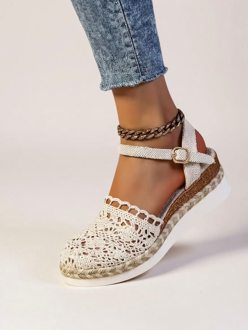 Espadrille style women's platform sandals with a textured boho ankle strap, great for summer.