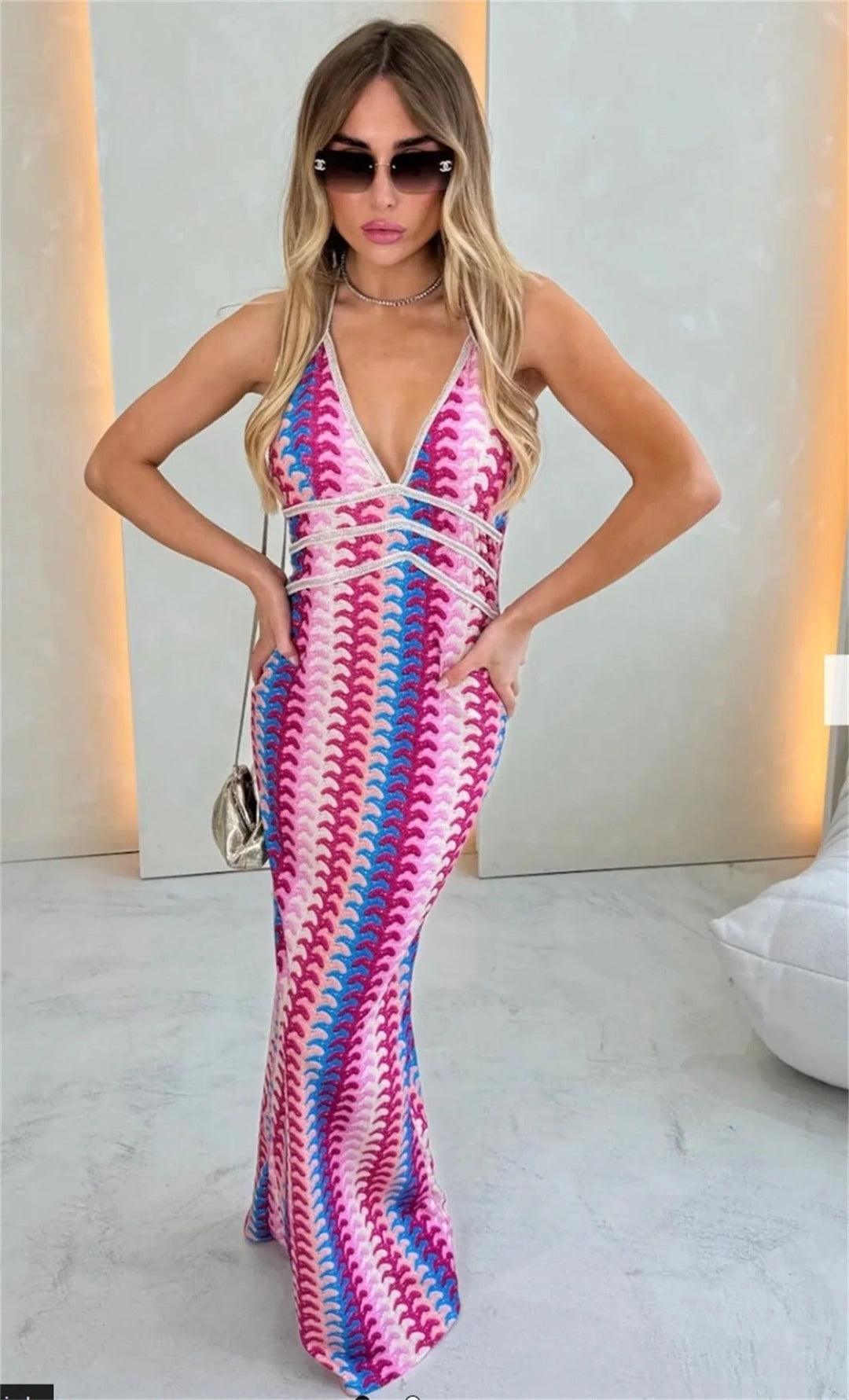Women's boho printed maxi dress with V-neck & halter neck, perfect for wedding guests or summer occasions.